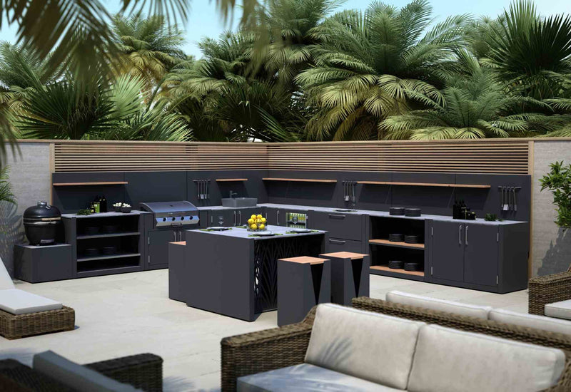 Luxury L shaped outdoor kitchen with central island, BBQ cabinet and bar seating.