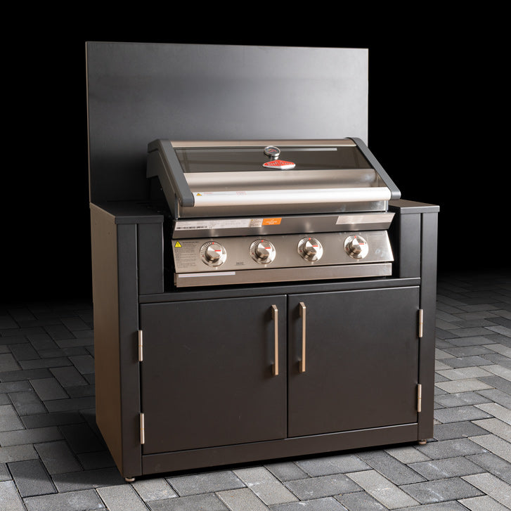 Outdoor BBQ cabinet with stainless steel grill space, double doors and back panel.