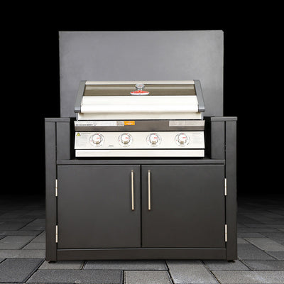 Outdoor grill with cabinets on a dark background