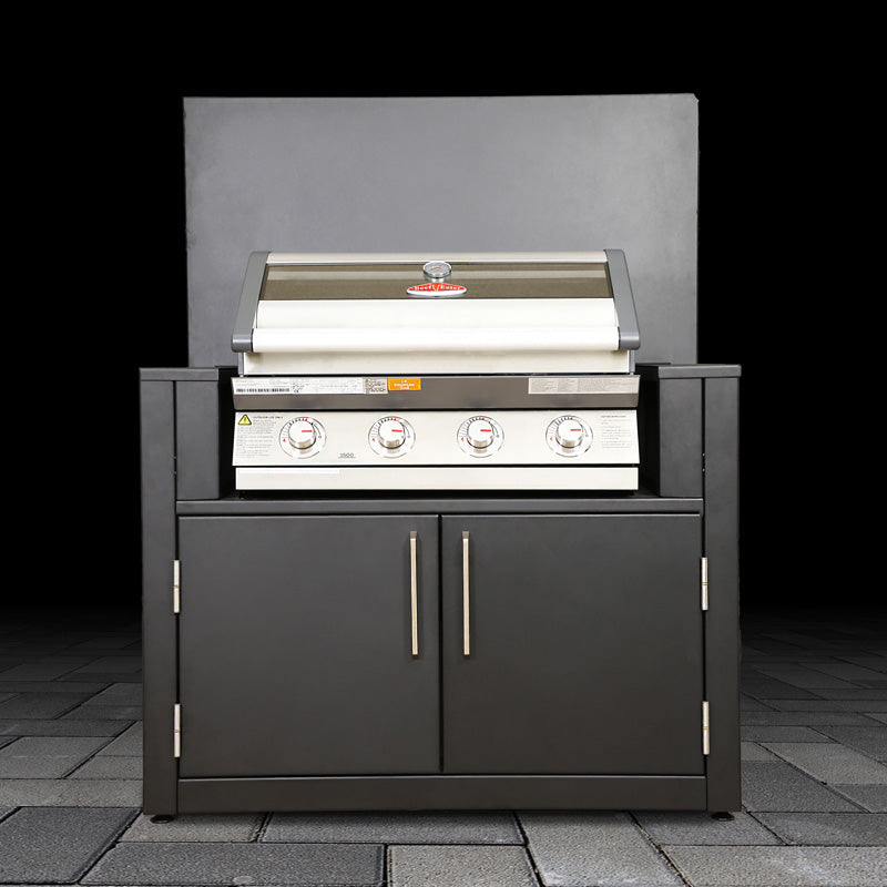 Outdoor grill with cabinets on a dark background