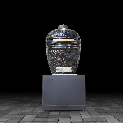 Outdoor kamado grill base unit on a black background
