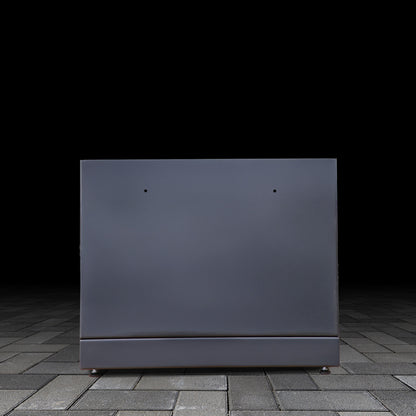 Black outdoor kamado grill base unit on a dark pavement background