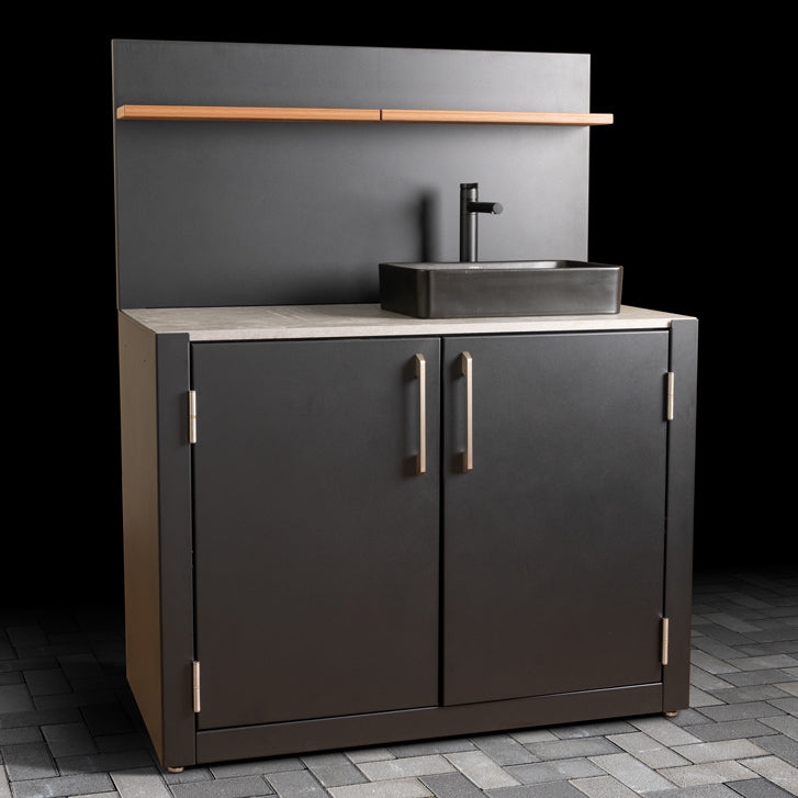 Outdoor Sink Unit with Dual-Doors, matte black basin, stainless steel handles, ceramic tile worktop, back panel and composite wood effect shelves.