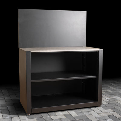 open shelving unit with a black back panel on a tiled floor.